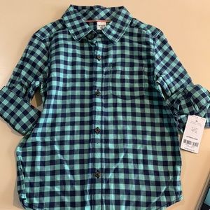 blue and teal . Long sleeve folded for cuffs.